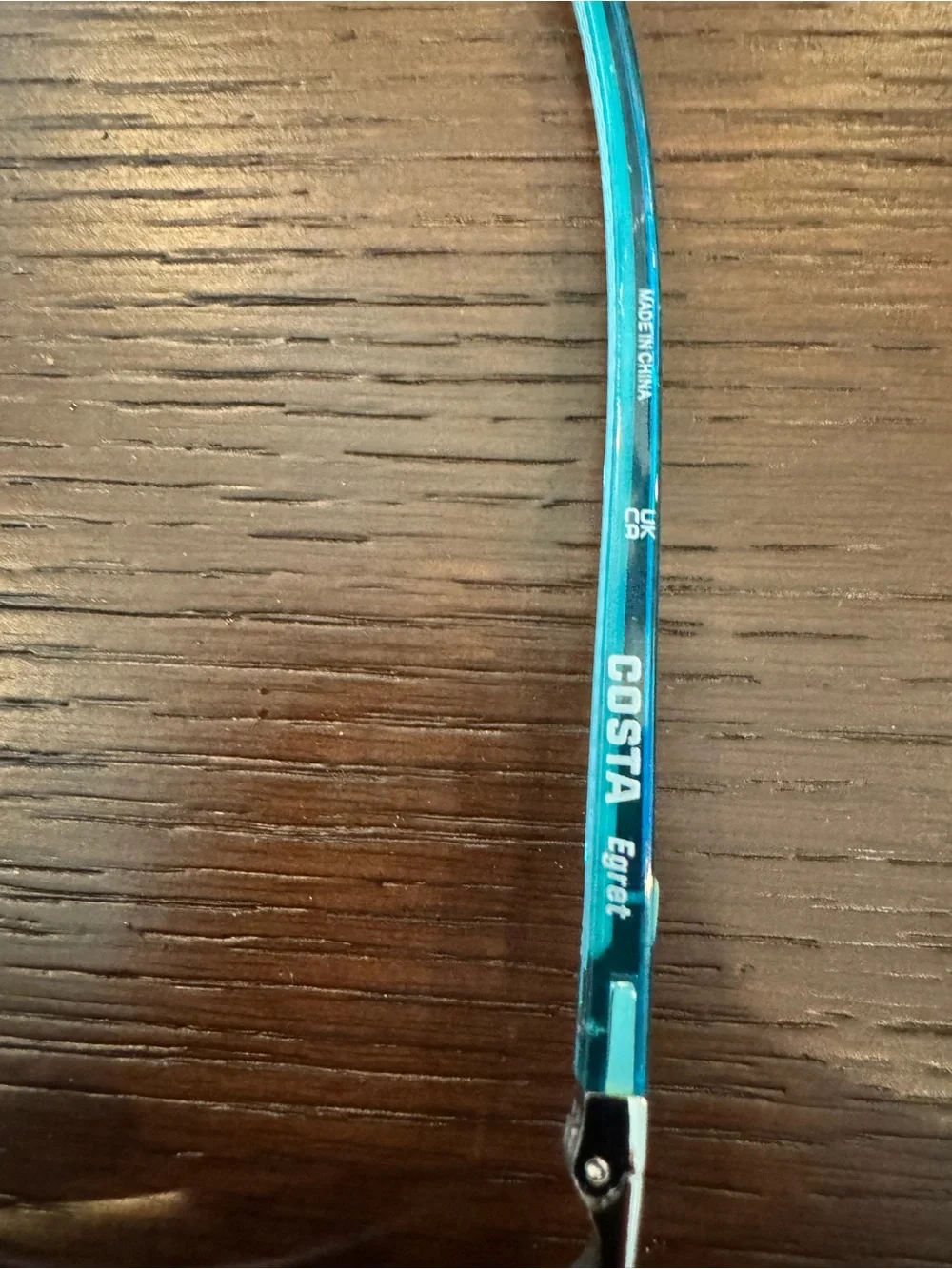 Costa Teal Frame Polarized women’s Sunglasses